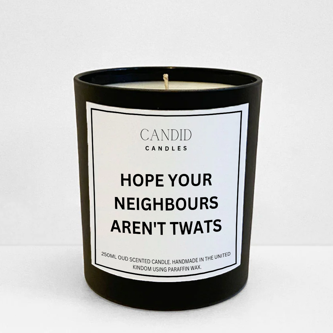 Funny scented candle labelled "Hope Your Neighbours Aren't Twats"  in black glass jar